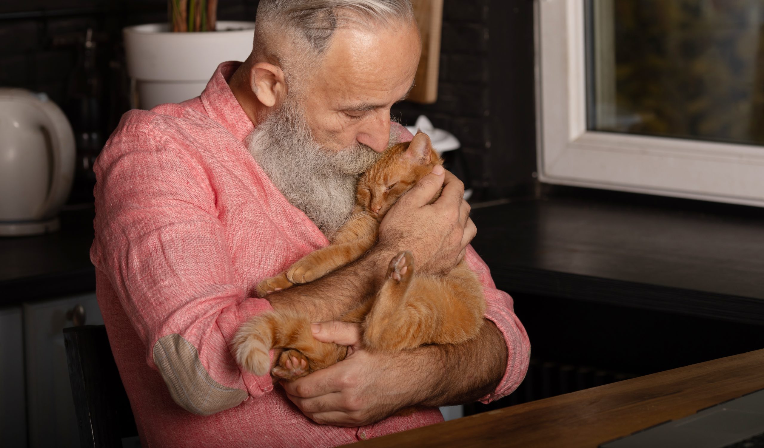 Man holding cat