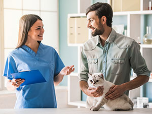 Veterinarian with client